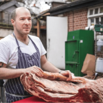 Butcher Preparing Meat